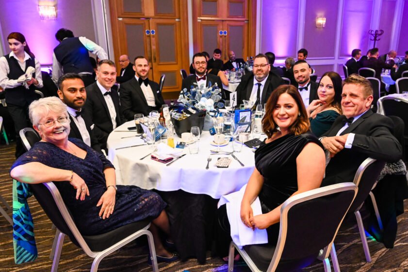 Photo of guests at diner table
