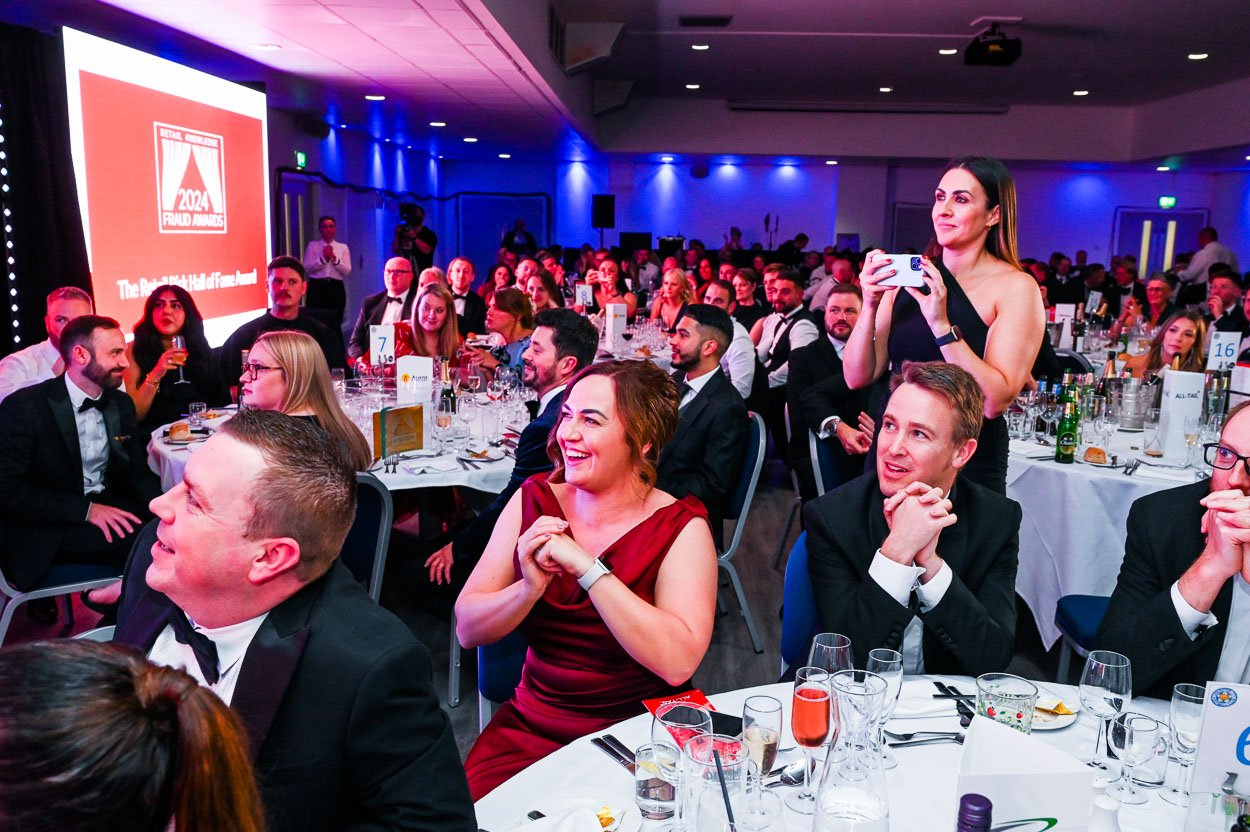 Photograph - Audience applauding at formal awards evening