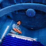 Photography - portrait of a microwave researcher in anechoic chamber
