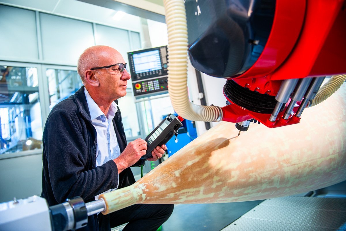 Photograph - Man Operating CNC machining of aerospace component