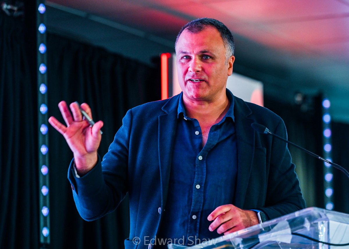 Speaker on stage at conference, Midlands UK