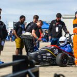 Student engineers working on Formula Student race car